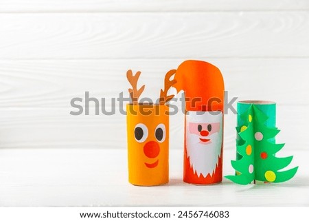 Toilet paper crafts on a colored background. Kids crafts made with toilet paper roll. DIY. Handmade. Paper toys. Origami animals. Concept of children's educational games. Place for text. Copy space.