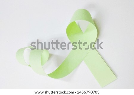 Green ribbon with white background. wear your green ribbon proudly to support for mental health awareness.