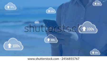 Image of clouds with arrows and percent going up over caucasian woman using smartphone. global cloud computing, digital interface and data processing concept digitally generated image.