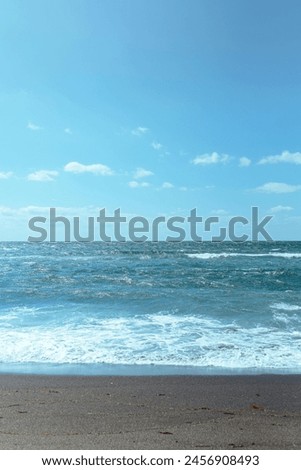 A beautiful picture of blue ocean with blue sky.