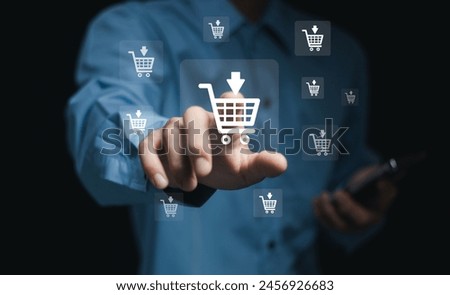 Man touching shopping cart, online shopping, internet business technology on virtual screen Online shopping icon mobile payment online, shopping online, finance, internet network technology concept