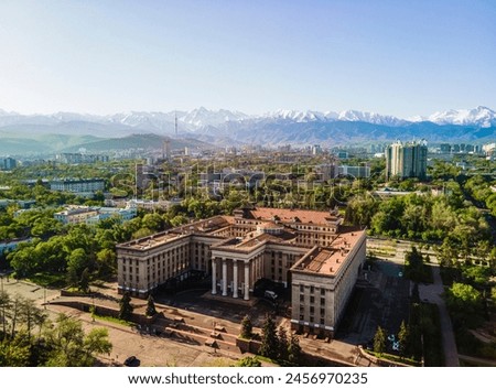 Aerial photography from a drone of an ancient building in the city of Almaty. View of the Kazakh-British Technical University from a drone. View of the city of Almaty in spring.