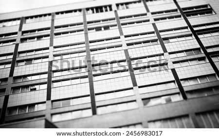 Diagonal black  white windows of modern building backdrop