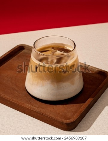 coffee concoction containing milk and palm sugar Royalty-Free Stock Photo #2456989107