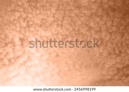 tender fluffy soft clouds the color of peach fluff. Royalty-Free Stock Photo #2456998199