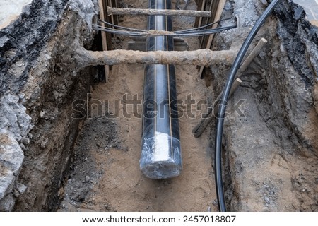 tubes underground, replacement of water and gas systems. Urban development project. City street infrastructure maintenance includes repairing pipes and upgrading 
