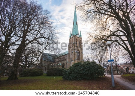 Church in Gothenburg and beautiful park in winter sunny day, Sweden  Royalty-Free Stock Photo #245704840