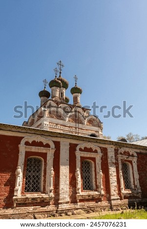 The windows of the monastery and the Orthodox church. Richly decorated stucco windows as part of the church. Selected Focus. High quality photo