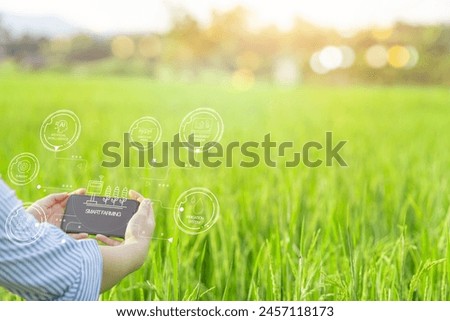 Smart farming uses technology to control planting, caring for harvesting products in the farms of new generation of farmers. Modern agriculture can reduce labor and costs and produce quality products Royalty-Free Stock Photo #2457118173