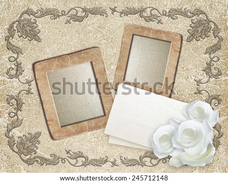 Old grunge photo frame with roses and paper for letter   