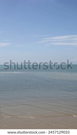 Exterior photo visual view of a fresh vertical seascape sea ocean landscape with horizon skyline sill water calm serenity lost pure purity