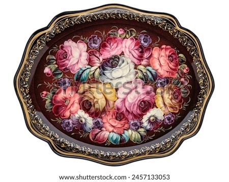 Empty Old Slavic folk handpainted metal tray with floral color pattern on white. Serving Plate with decorative border. Painted dish. Use for interior design. Top view. Royalty-Free Stock Photo #2457133053