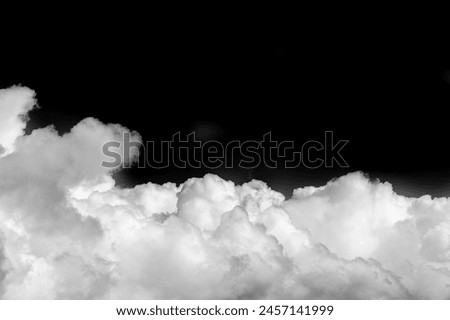 White cloud on a black background. Contrasting colors create a bold and vibrant visual effect. Symbolizes simplicity, purity and clarity. Stands out and attracts attention in any design Royalty-Free Stock Photo #2457141999