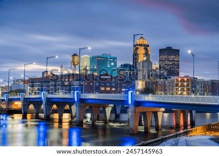 Des Moines, Iowa, USA downtown cityscape on the river at twilight. Royalty-Free Stock Photo #2457145963