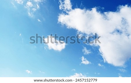 The sun shining through the puffy clouds. 3d ceiling decoration image. Sky bottom up view. Beautiful sunny sky. Stretch ceiling sky model. Royalty-Free Stock Photo #2457152779