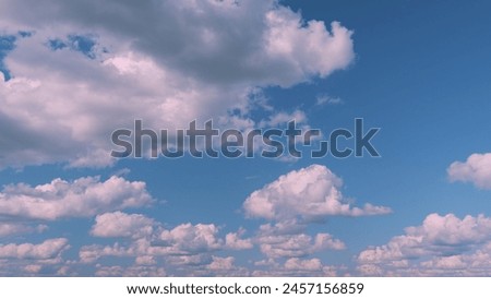 Purple Afternoon Sky And Clouds. Background Of Blue Sky With Pale Pink Clouds At Day. Royalty-Free Stock Photo #2457156859
