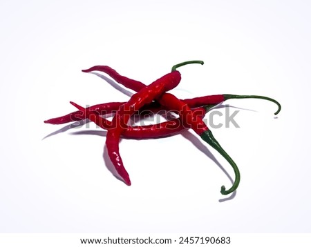 red chilies on a white background