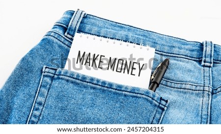 Business concept , business idea,business analysis. MAKE MONEY on a notebook from a pocket next to a pen