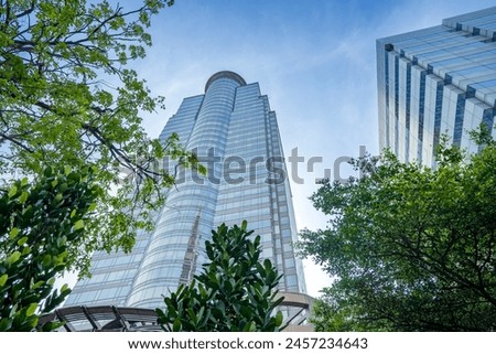Low angle view of skyscrapers in Jakarta. Skyscrapers and office building with blue sky background