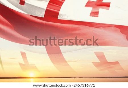 Georgia national flag waving in the sky.