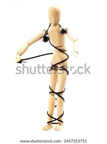 wood mannequin with stereo headphone isolated on white background