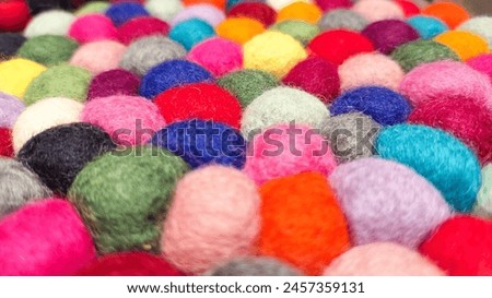 Multi colored felt bag rug. beautiful wool color background. colorful texture. Royalty-Free Stock Photo #2457359131