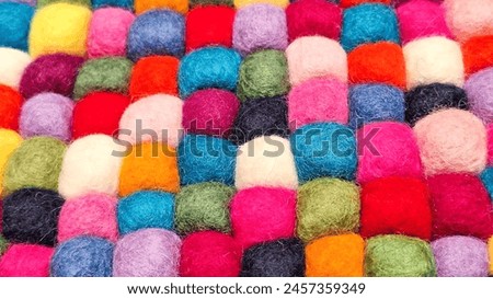 Multi colored felt bag rug. beautiful wool color background. colorful texture. Royalty-Free Stock Photo #2457359349