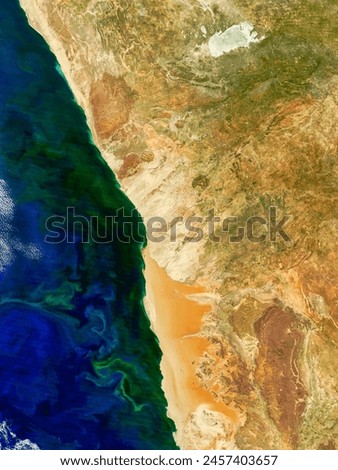 Hydrogen sulphide eruptions along the coast of Namibia. . Elements of this image furnished by NASA.