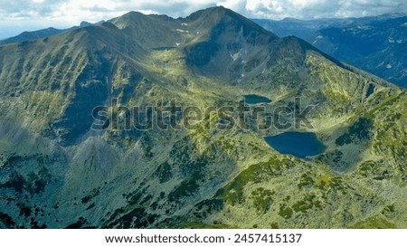 Mountain lakes from a drone aerial photography. The highest peak Musala in the Balkans in Bulgaria, height 2925 meters. Mountain lakes, mountain huts and the spirit of travel