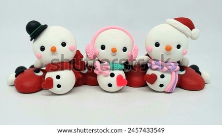 Christmas clay doll snowman.  Handicrafts for any decoration.