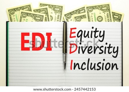 EDI equity diversity inclusion symbol. Concept words EDI equity diversity inclusion on white note. Beautiful dollar bills background. Business EDI equity diversity inclusion concept. Copy space.