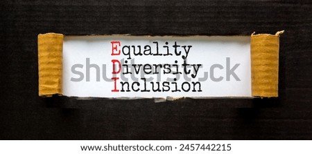 EDI equality diversity inclusion symbol. Concept words EDI equality diversity inclusion on white paper on beautiful black background. Business EDI equality diversity inclusion concept. Copy space.