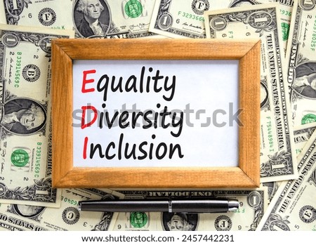 EDI equality diversity inclusion symbol. Concept words EDI equality diversity inclusion on wooden frame. Beautiful dollar background. Business EDI equality diversity inclusion concept. Copy space.