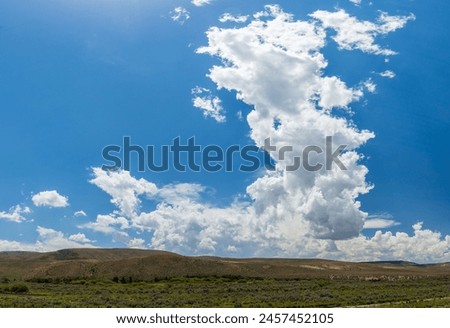 clouds forming over summer landscape 