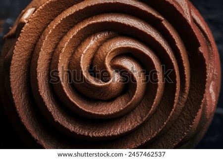 Chocolate frosting texture background close-up