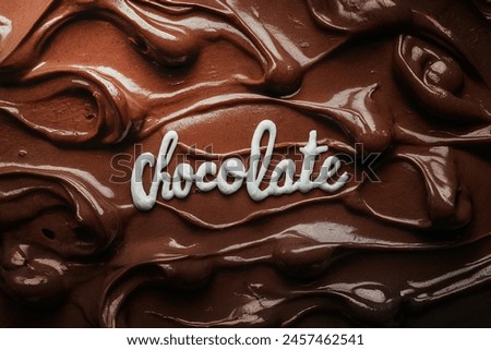 Chocolate frosting texture background close-up