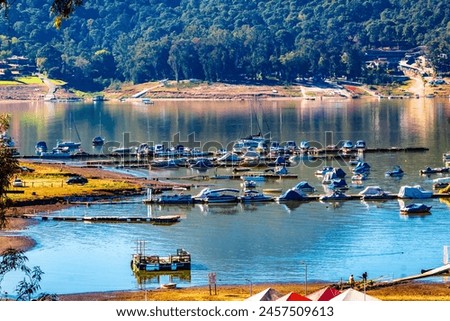 Boats, motorboats and marine vessels on a lake in Valle de Bravo state of Mexico