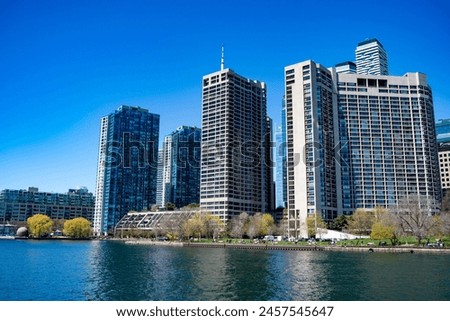 View of Toronto waterfront park and buildings from Lake Ontario.