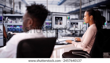 African American Video Editor Tech Job Using Computer