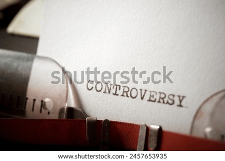Controversy word written with a typewriter. Royalty-Free Stock Photo #2457653935