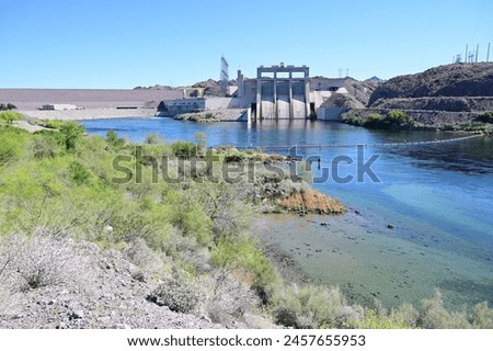 Davis Dam on the Colorado River forming Lake Mohave. Royalty-Free Stock Photo #2457655953