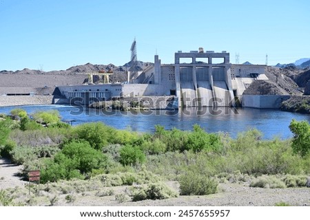 Davis Dam on the Colorado River forming Lake Mohave. Royalty-Free Stock Photo #2457655957