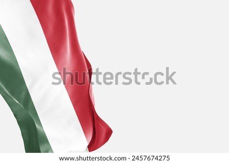 National flag of Hungary flutters in the wind. Wavy Hungary Flag. Close-up front view.