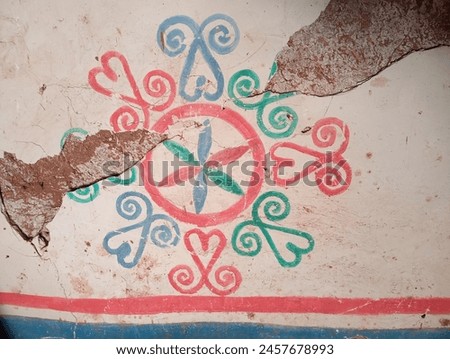 A picture of old handmade dyeing and wall decorations, in red and blue and green,  a unique picture and a good quality !