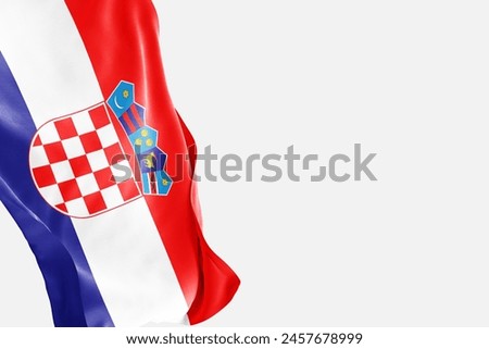 National flag of Croatia flutters in the wind. Wavy Croatia Flag. Close-up front view.