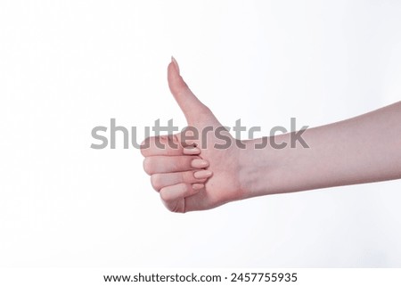female hands isolated. Fingers and gestures.thumbs up