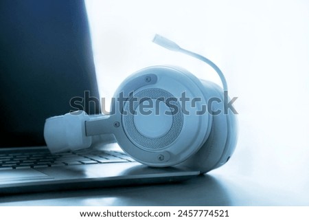 IT service desk or Help desk; Call center support; Headphone on computer laptop