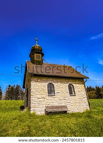 small church in the middle of the countryside. beautiful blue sky on a May 1st