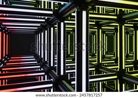 Futuristic neon red yellow white light cube art installation. Technology cyber cube, Sci fi shape. Abstract conceptual background with colorful neon cubes.