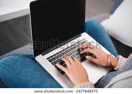 Laptop, hands and woman typing in house for online research with work from home creative job. Technology, mockup and female freelance copywriter with website or internet project in apartment.